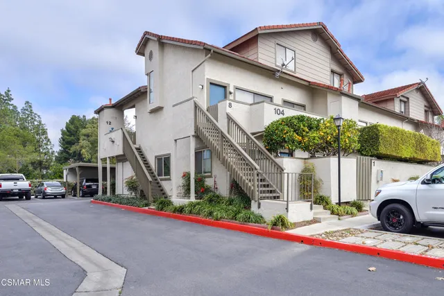 a view of a house with a street