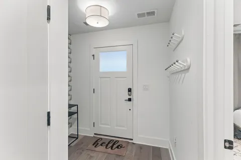 a view of a room with rack on the wall