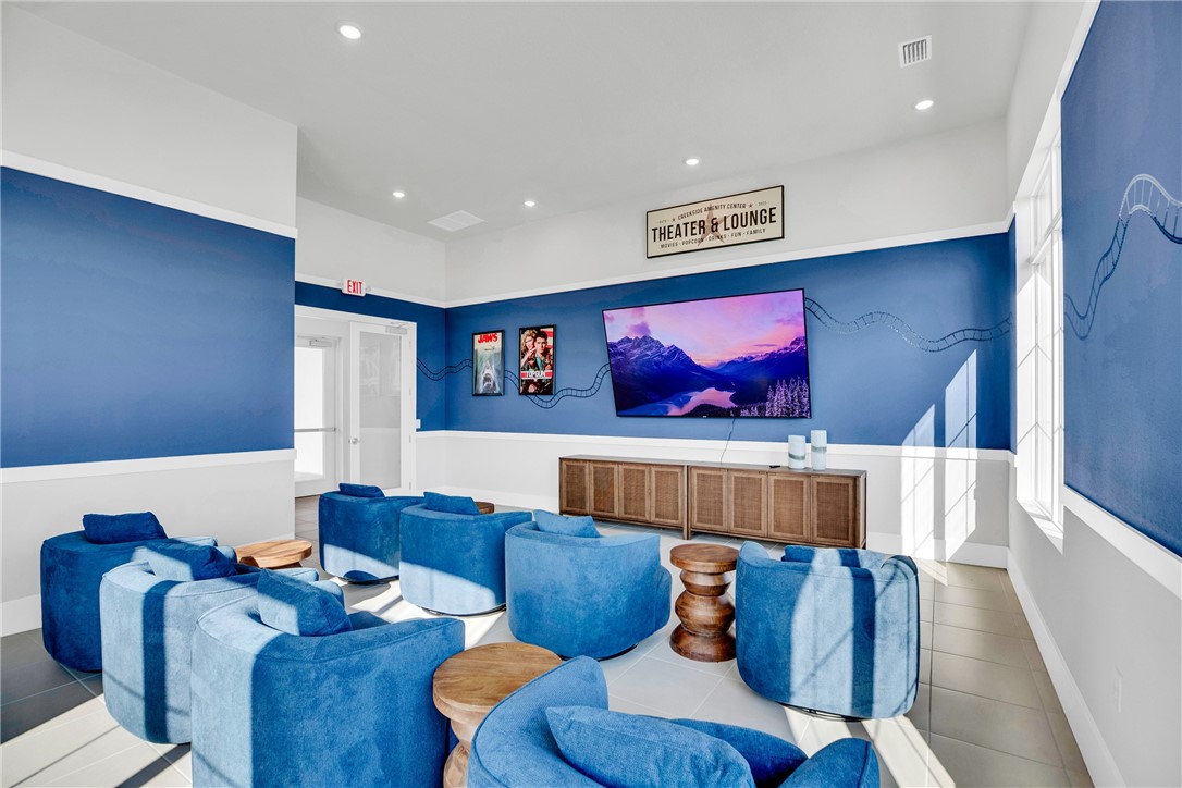 3453 Trinity Circle Fort Pierce, FL 34945 - Photo 34 of 36 a living room with furniture and a couch