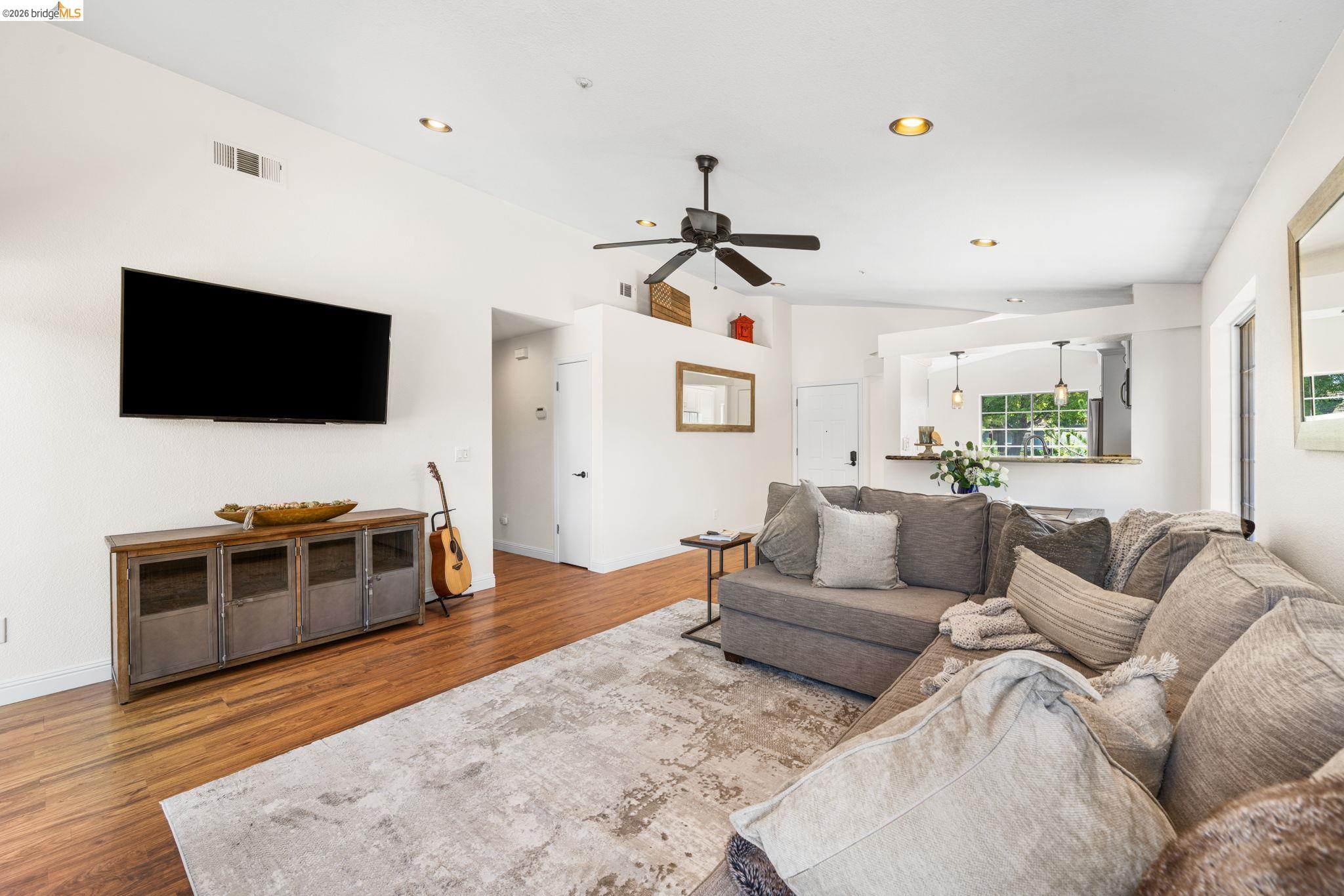 1186 El Rio Court Livermore, CA 94551 - Photo 10 of 60 Living area with wood-finish flooring, recessed lighting, and a ceiling fan