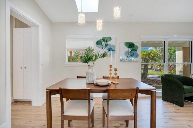 1926 Natalen Road Winter Park, FL 32792 - Photo 11 of 44 a view of a dining room with furniture window and wooden floor