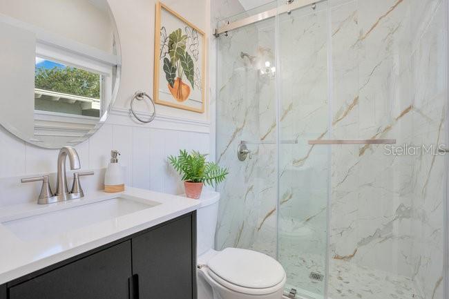 1926 Natalen Road Winter Park, FL 32792 - Photo 25 of 44 a bathroom with a sink a toilet and shower