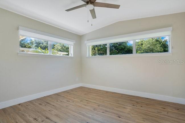 1926 Natalen Road Winter Park, FL 32792 - Photo 28 of 44 a view of an empty room with wooden floor and a window