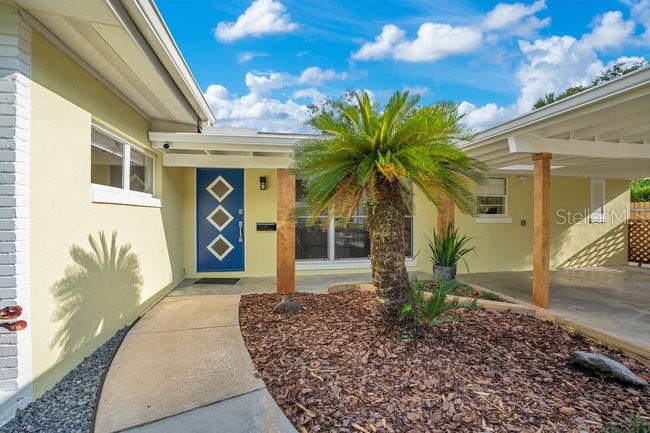 1926 Natalen Road Winter Park, FL 32792 - Photo 3 of 44 a front view of a house with garden