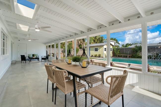 1926 Natalen Road Winter Park, FL 32792 - Photo 31 of 44 a view of a dining room with furniture window and wooden floor