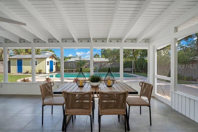 1926 Natalen Road Winter Park, FL 32792 - Photo 33 of 44 a view of a patio with dining table and chairs