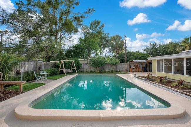 1926 Natalen Road Winter Park, FL 32792 - Photo 34 of 44 a view of a swimming pool with a yard