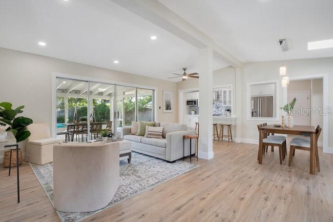 1926 Natalen Road Winter Park, FL 32792 - Photo 6 of 44 a living room with furniture and large windows