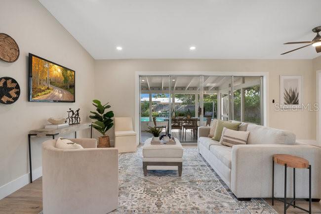 1926 Natalen Road Winter Park, FL 32792 - Photo 7 of 44 a living room with furniture and a flat screen tv