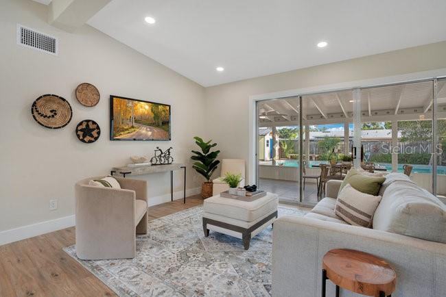 1926 Natalen Road Winter Park, FL 32792 - Photo 8 of 44 a living room with furniture and a flat screen tv