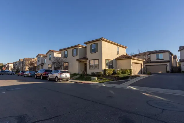a view of a street with cars