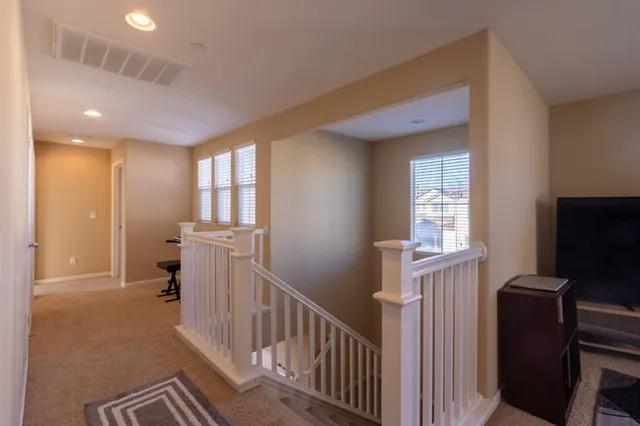 a bathroom with a double vanity sink mirror double and shower