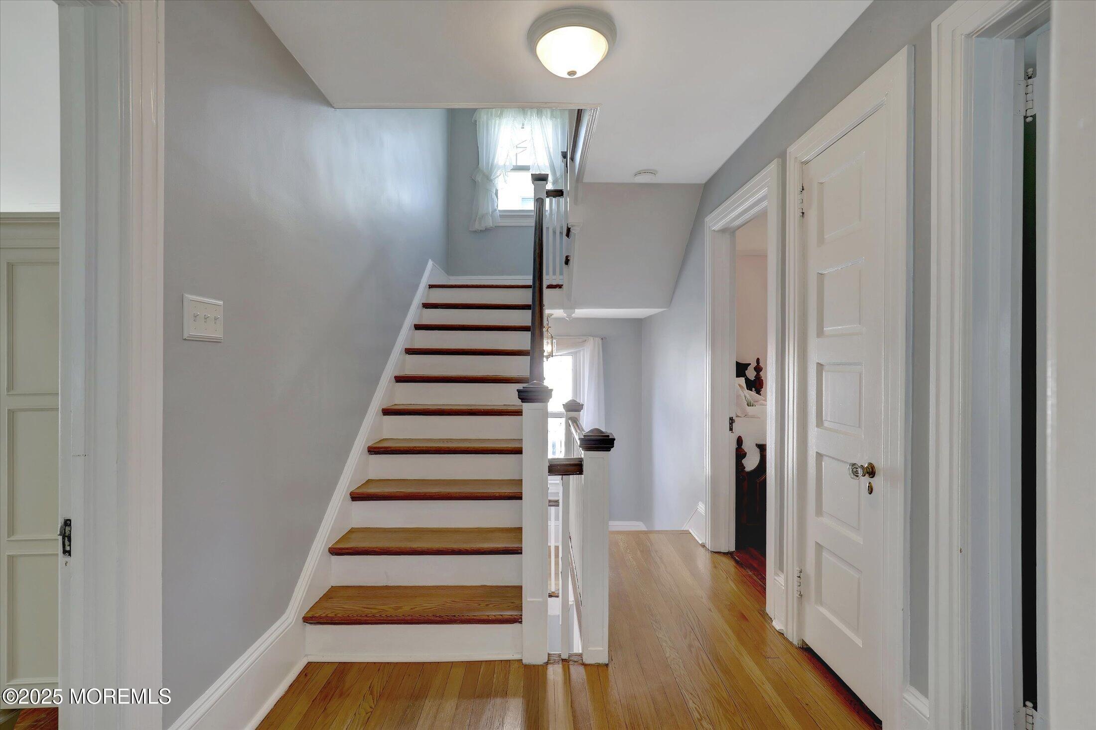 309 Spier Avenue Allenhurst, NJ 07711 - Photo 16 of 32 a view of a hallway with wooden floor and entryway