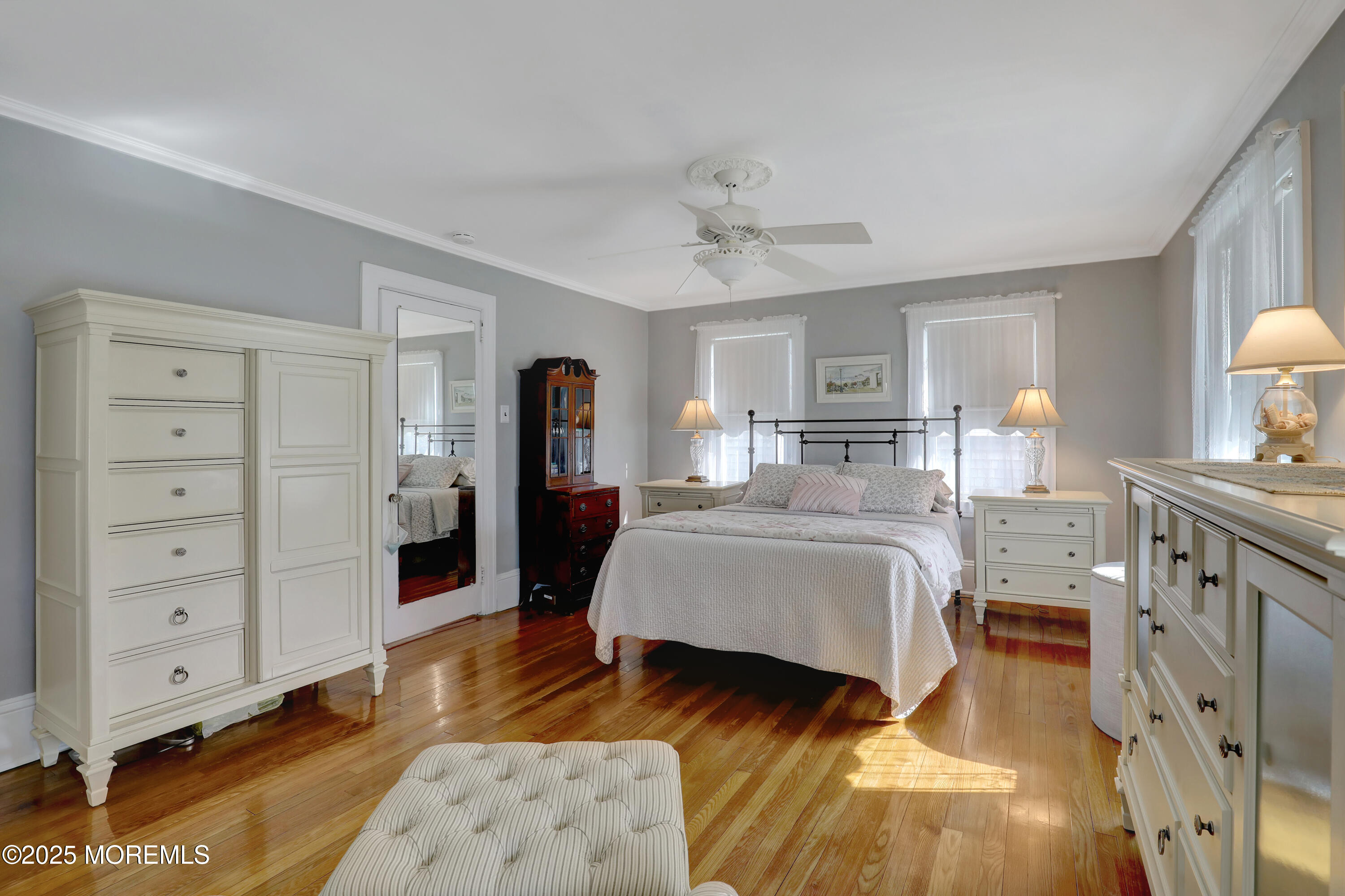 309 Spier Avenue Allenhurst, NJ 07711 - Photo 17 of 32 a spacious bedroom with a large bed and a window