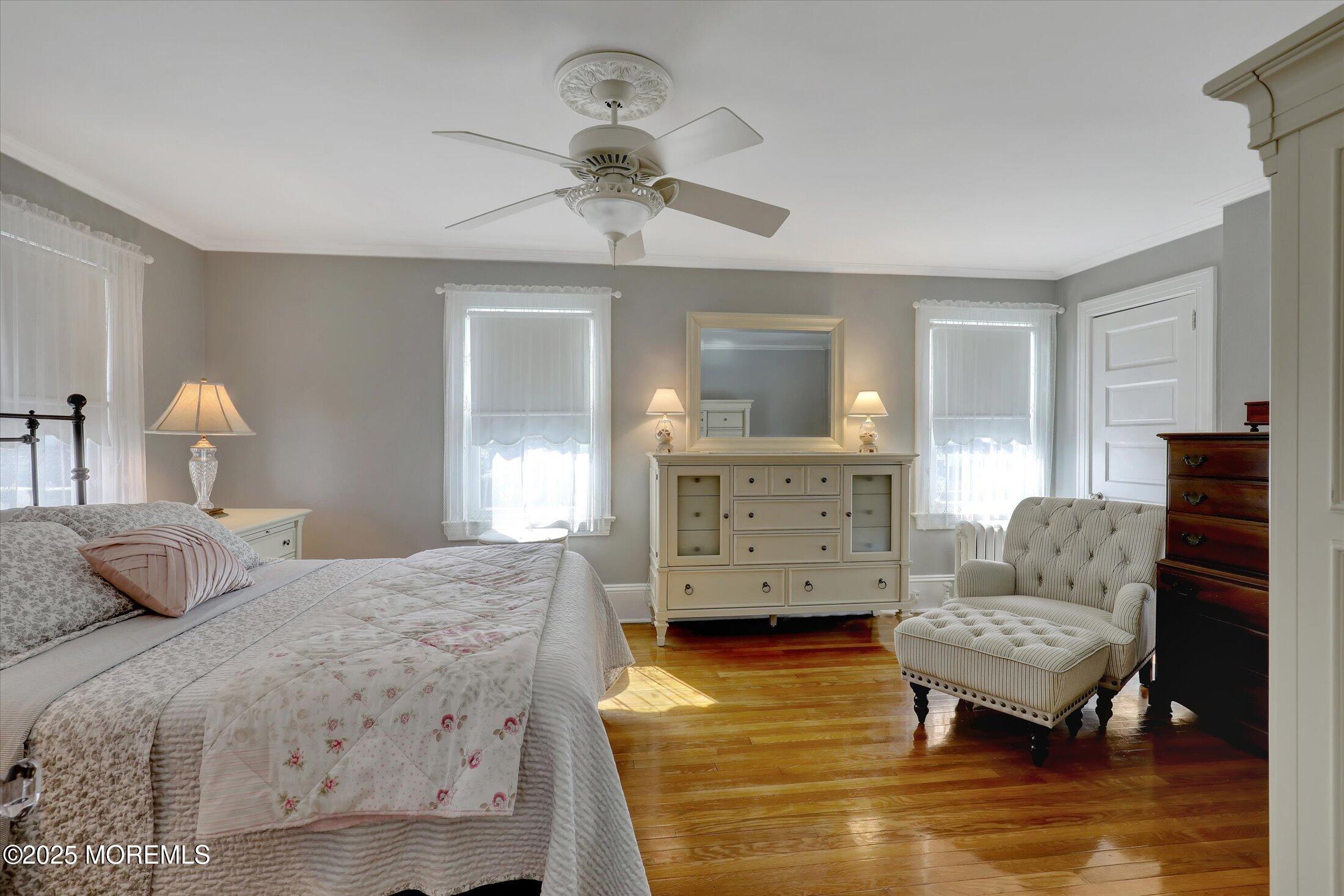 309 Spier Avenue Allenhurst, NJ 07711 - Photo 18 of 32 a bedroom with a bed and furniture
