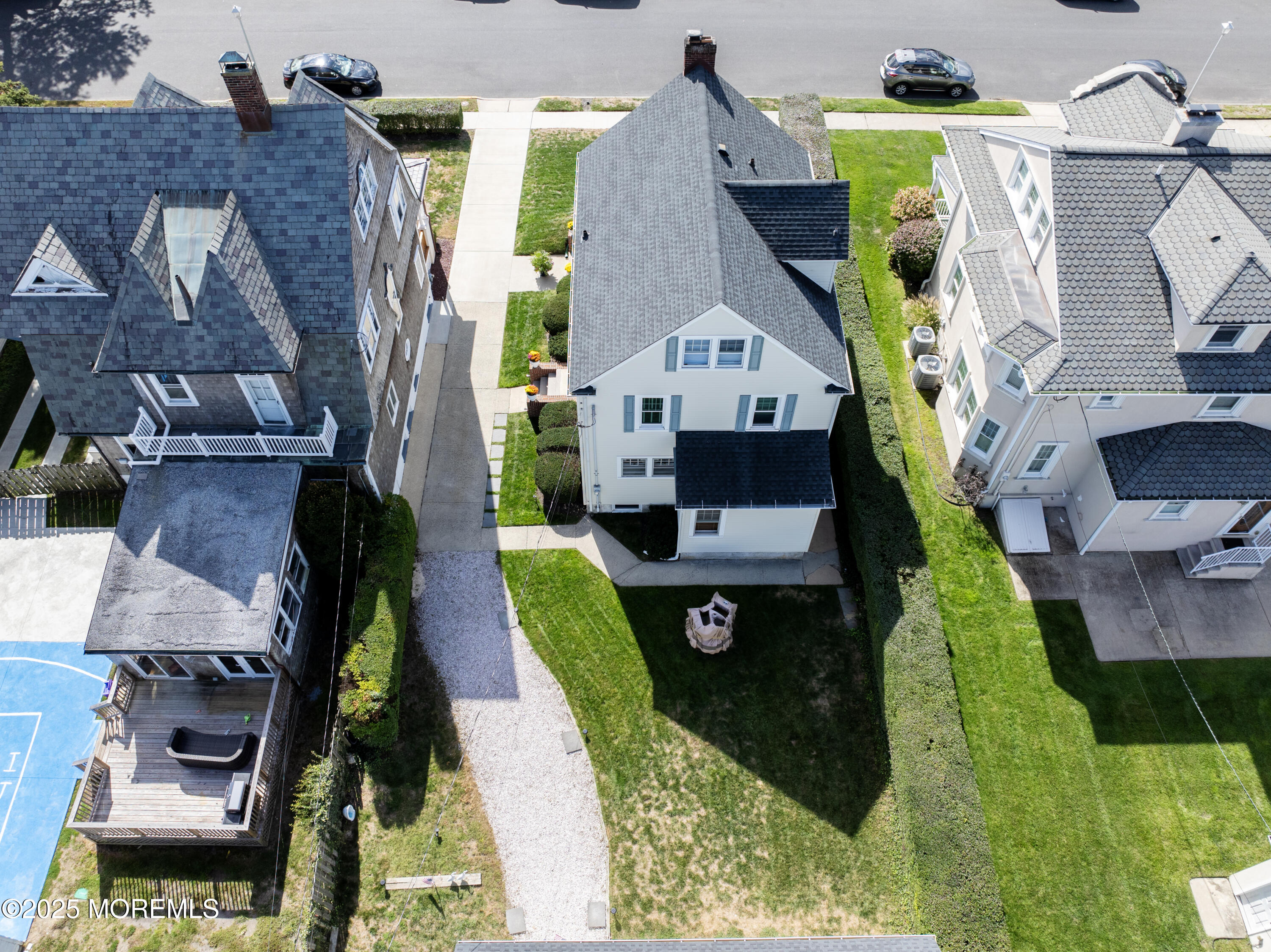 309 Spier Avenue Allenhurst, NJ 07711 - Photo 28 of 32 a living room with furniture and a table