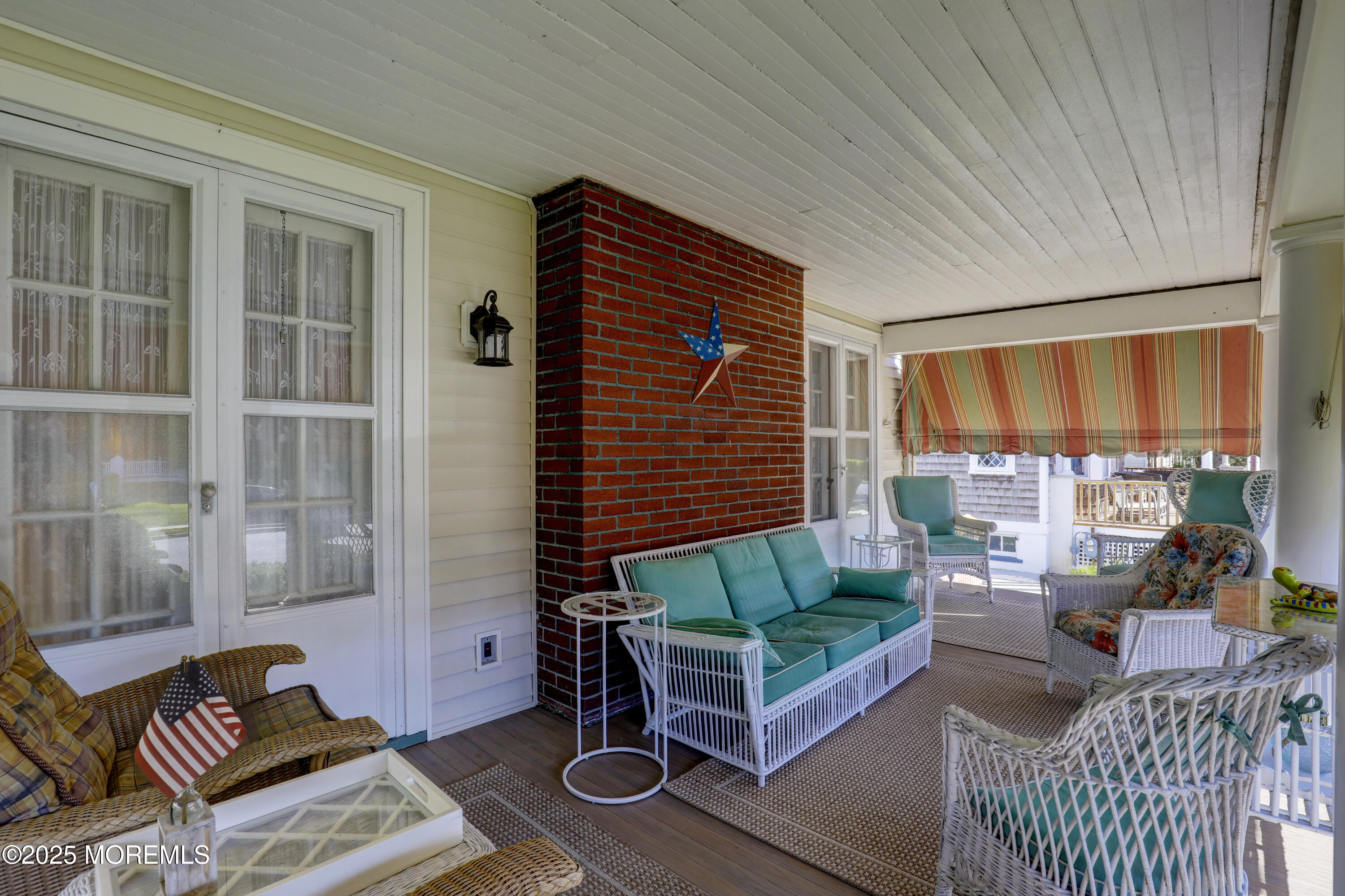 309 Spier Avenue Allenhurst, NJ 07711 - Photo 5 of 32 a living room with furniture and a window