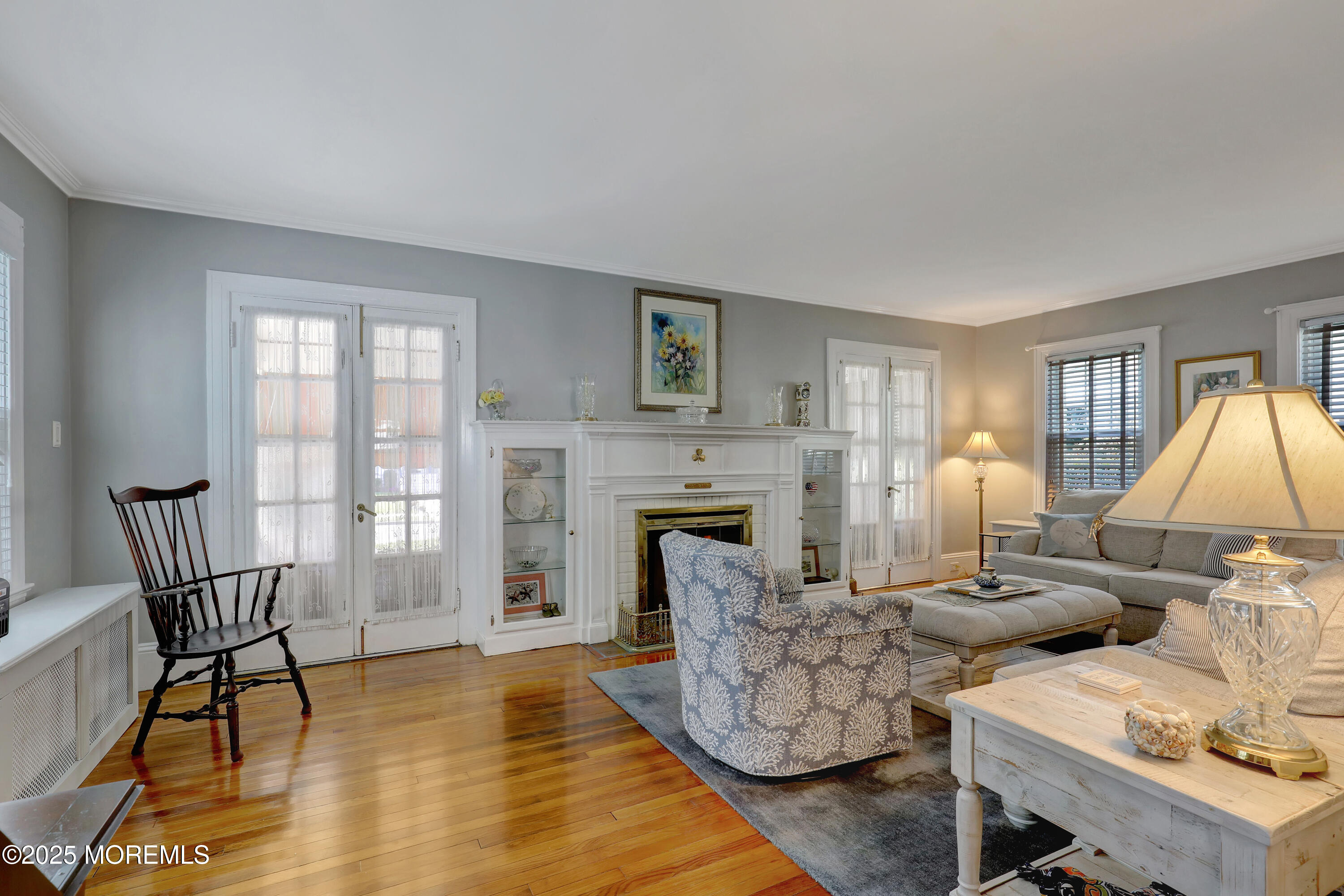 309 Spier Avenue Allenhurst, NJ 07711 - Photo 10 of 32 a living room with furniture and a fireplace
