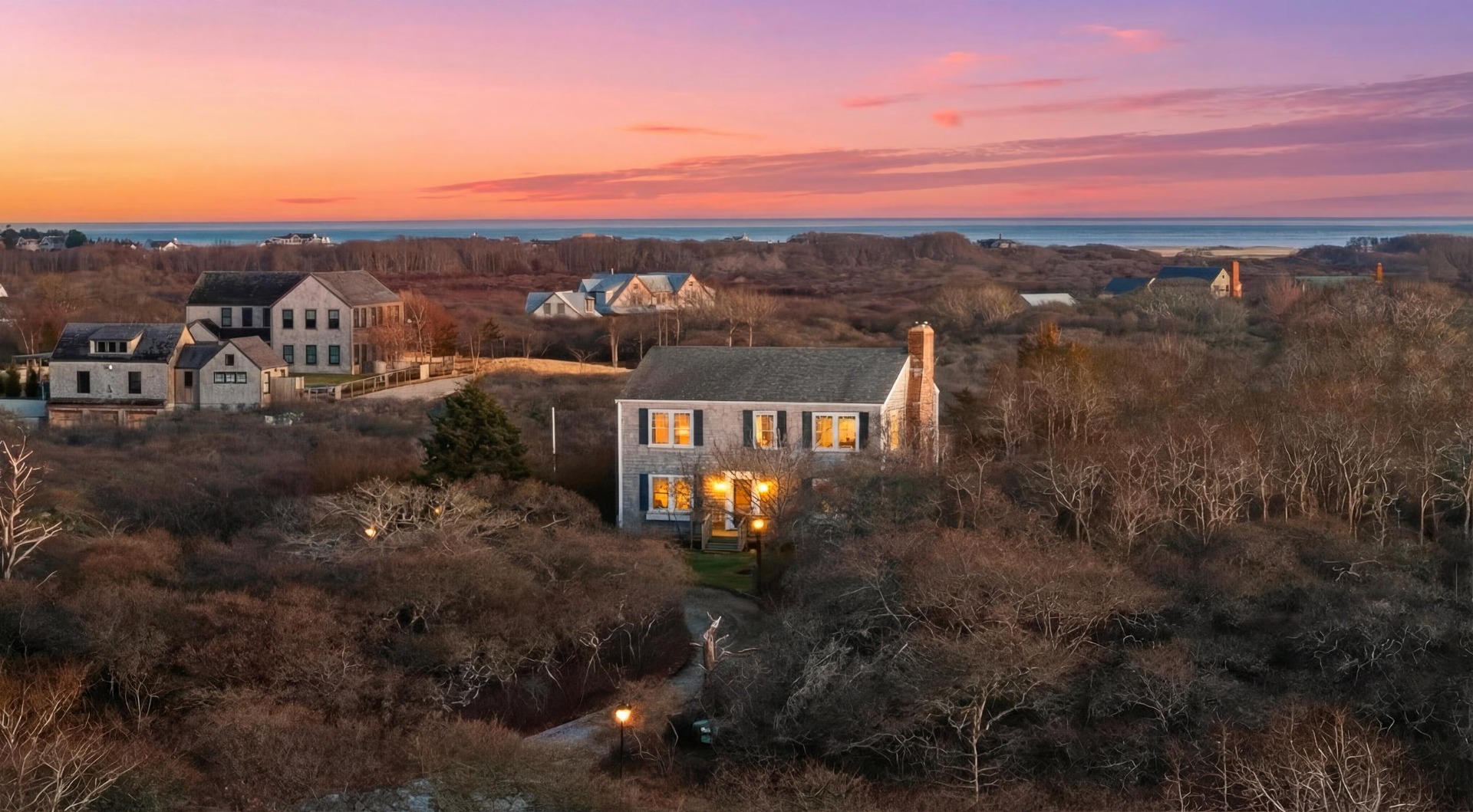 a view of a city with mountains in the background