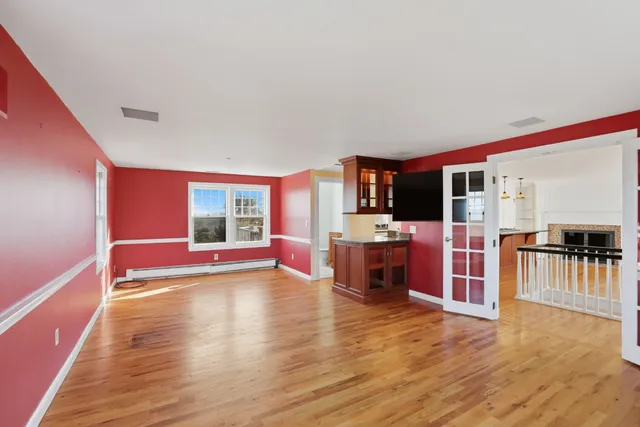 a bathroom with a sink a mirror and a shower