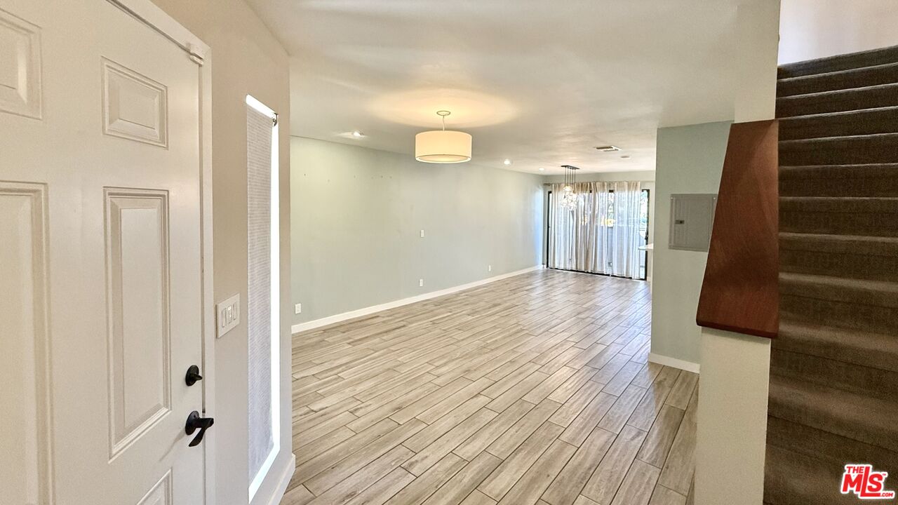 1802 20th Street, Unit B Santa Monica, CA 90404 - Photo 3 of 22 a view of a hallway with wooden floor
