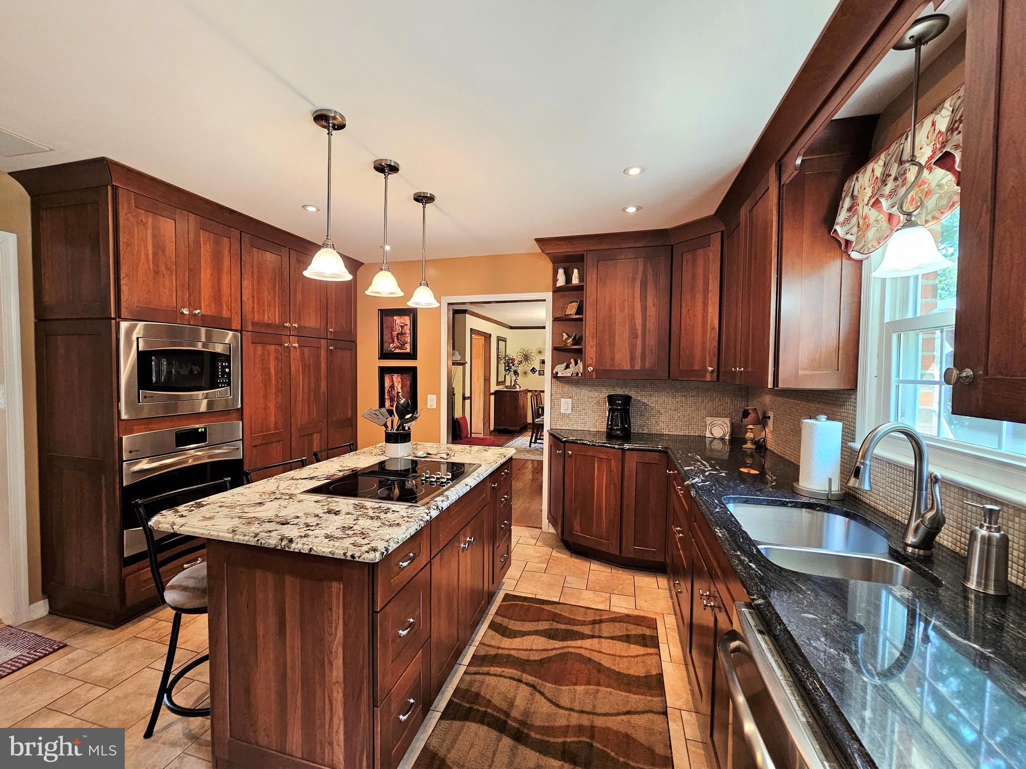 8813 Weems Road Manassas, VA 20110 - Photo 14 of 39 SS Appliances, Cherry Cabinets, Granite Counters