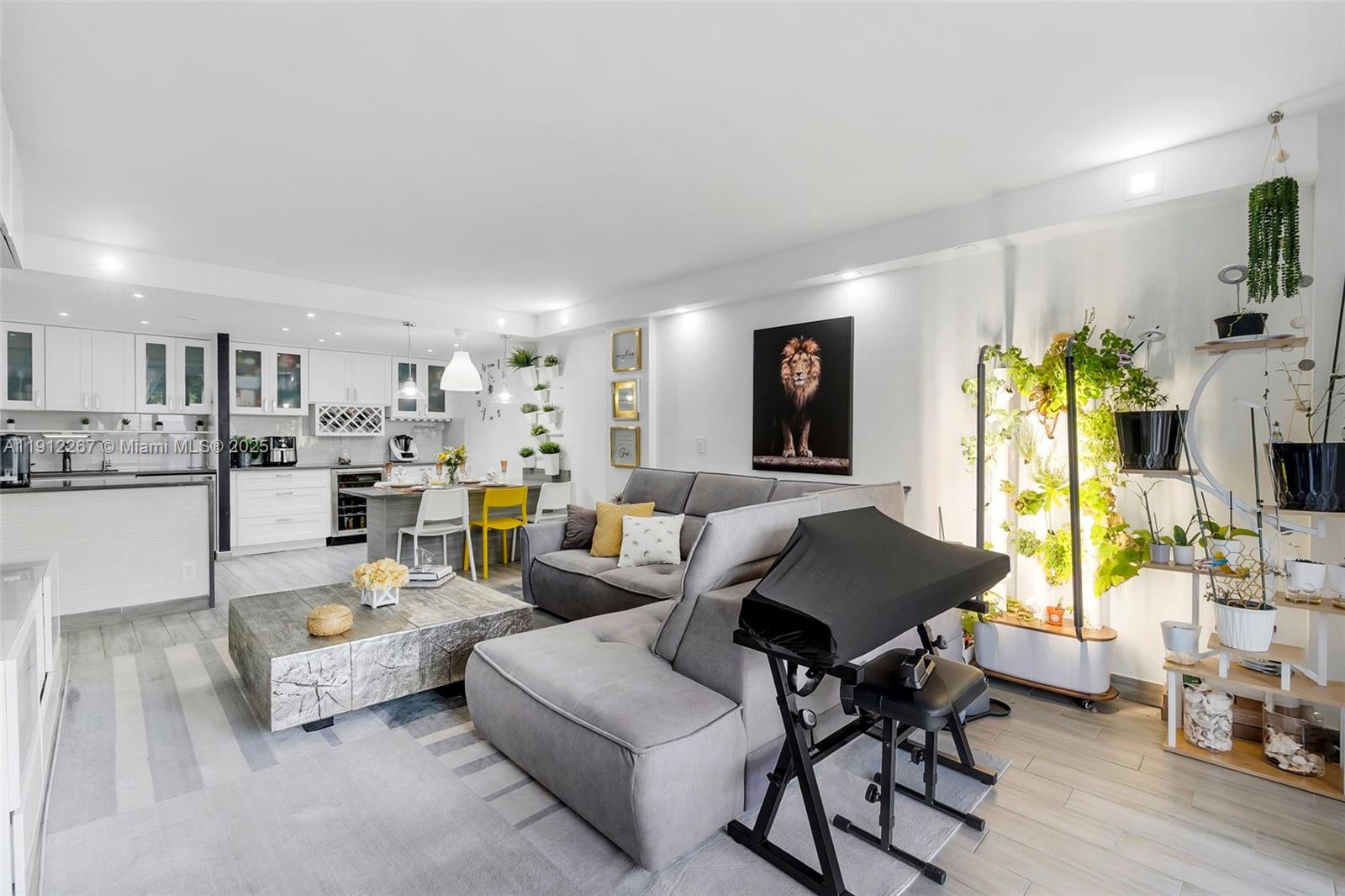 2121 North Ocean Boulevard, Unit 204W Boca Raton, FL 33431 - Photo 2 of 59 a living room with furniture and a table