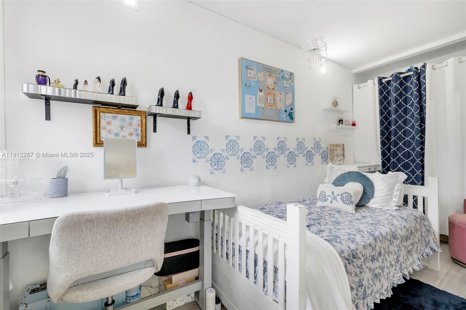 2121 North Ocean Boulevard, Unit 204W Boca Raton, FL 33431 - Photo 21 of 59 a bedroom with a bed and a table