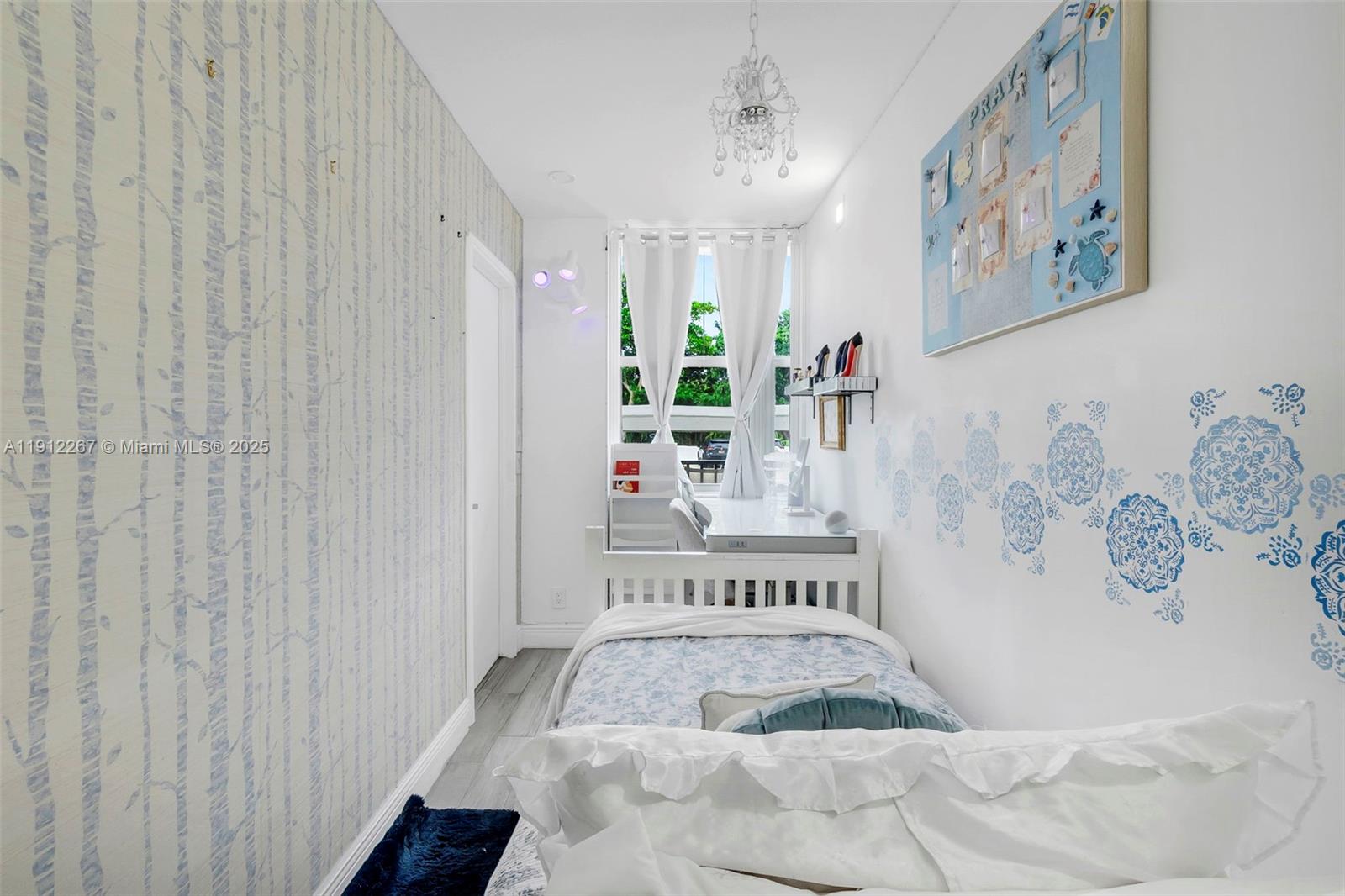 2121 North Ocean Boulevard, Unit 204W Boca Raton, FL 33431 - Photo 22 of 59 a spacious bedroom with a bed and a painting on the wall