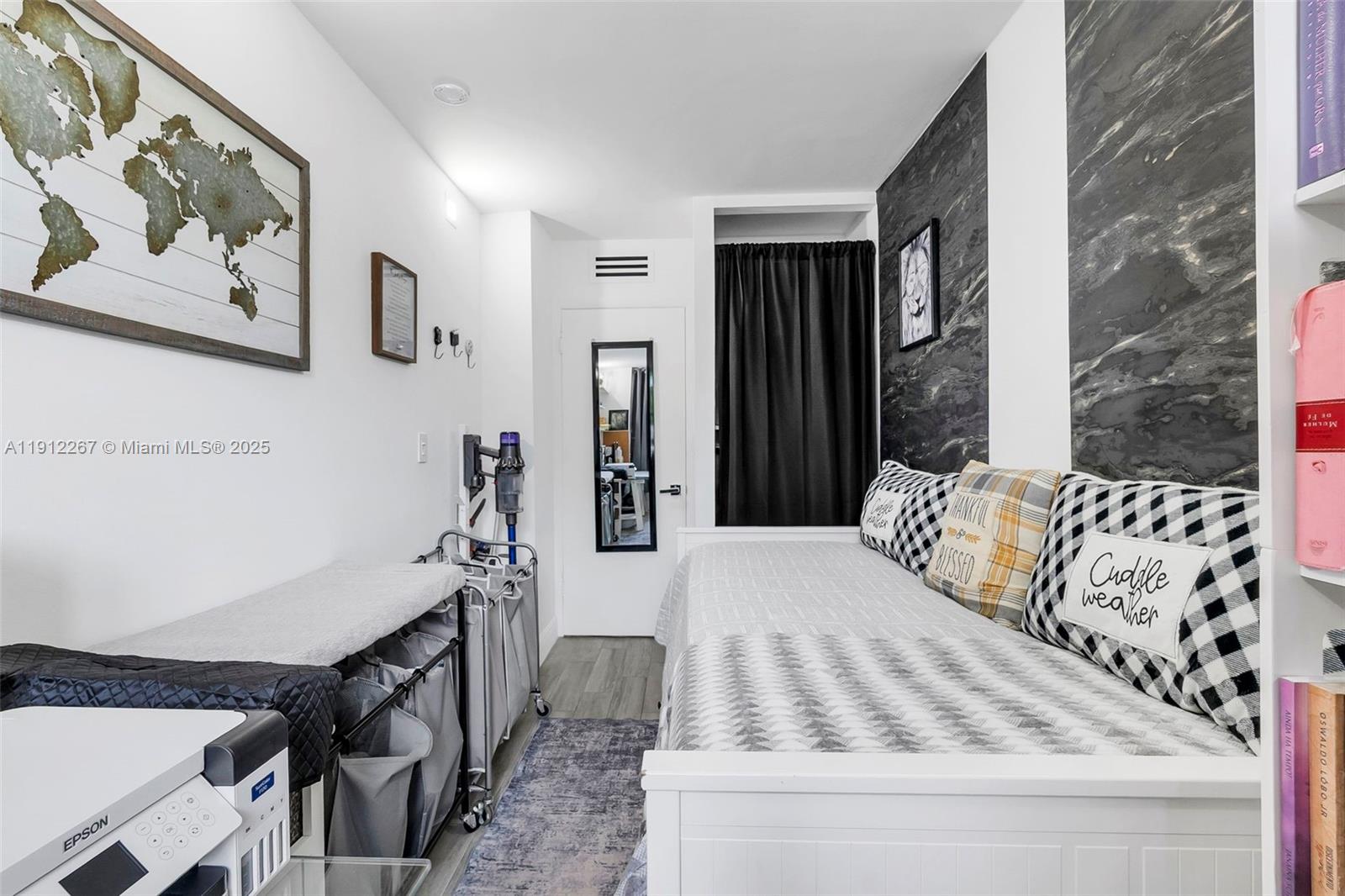 2121 North Ocean Boulevard, Unit 204W Boca Raton, FL 33431 - Photo 24 of 59 a bedroom with a bed and a mirror