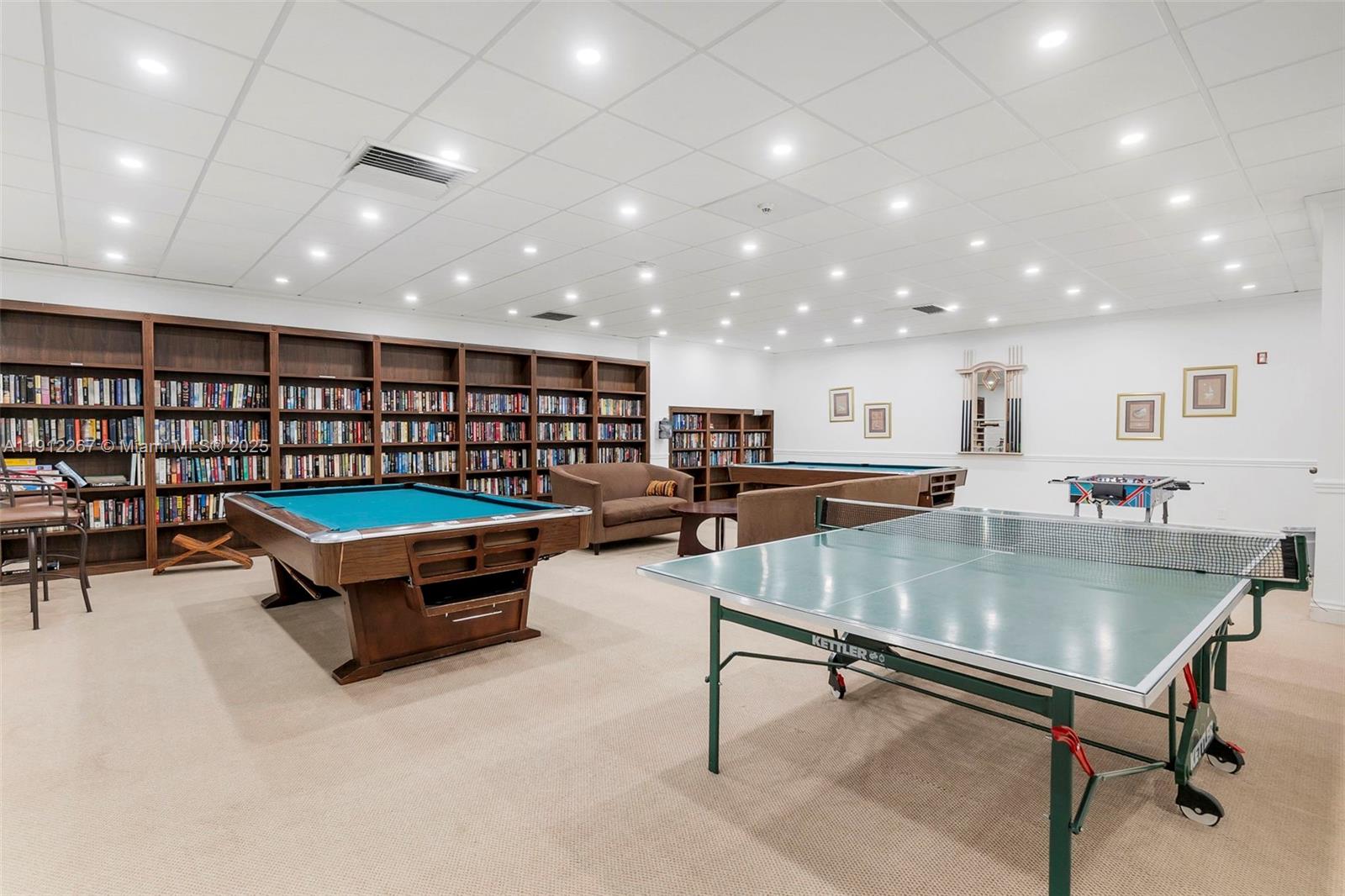 2121 North Ocean Boulevard, Unit 204W Boca Raton, FL 33431 - Photo 40 of 59 a room with furniture and a table