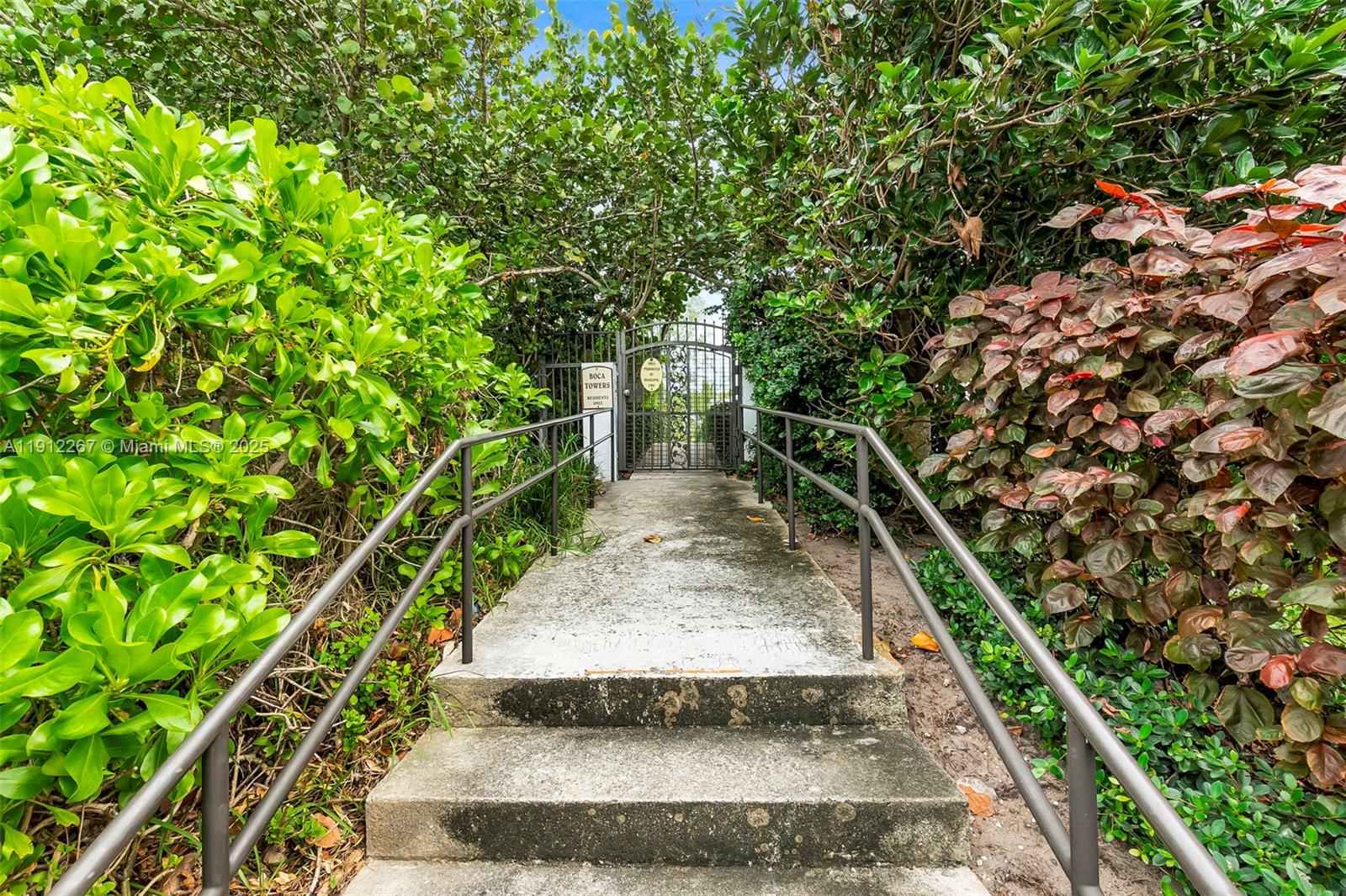 2121 North Ocean Boulevard, Unit 204W Boca Raton, FL 33431 - Photo 51 of 59 a view of a pathway with a yard