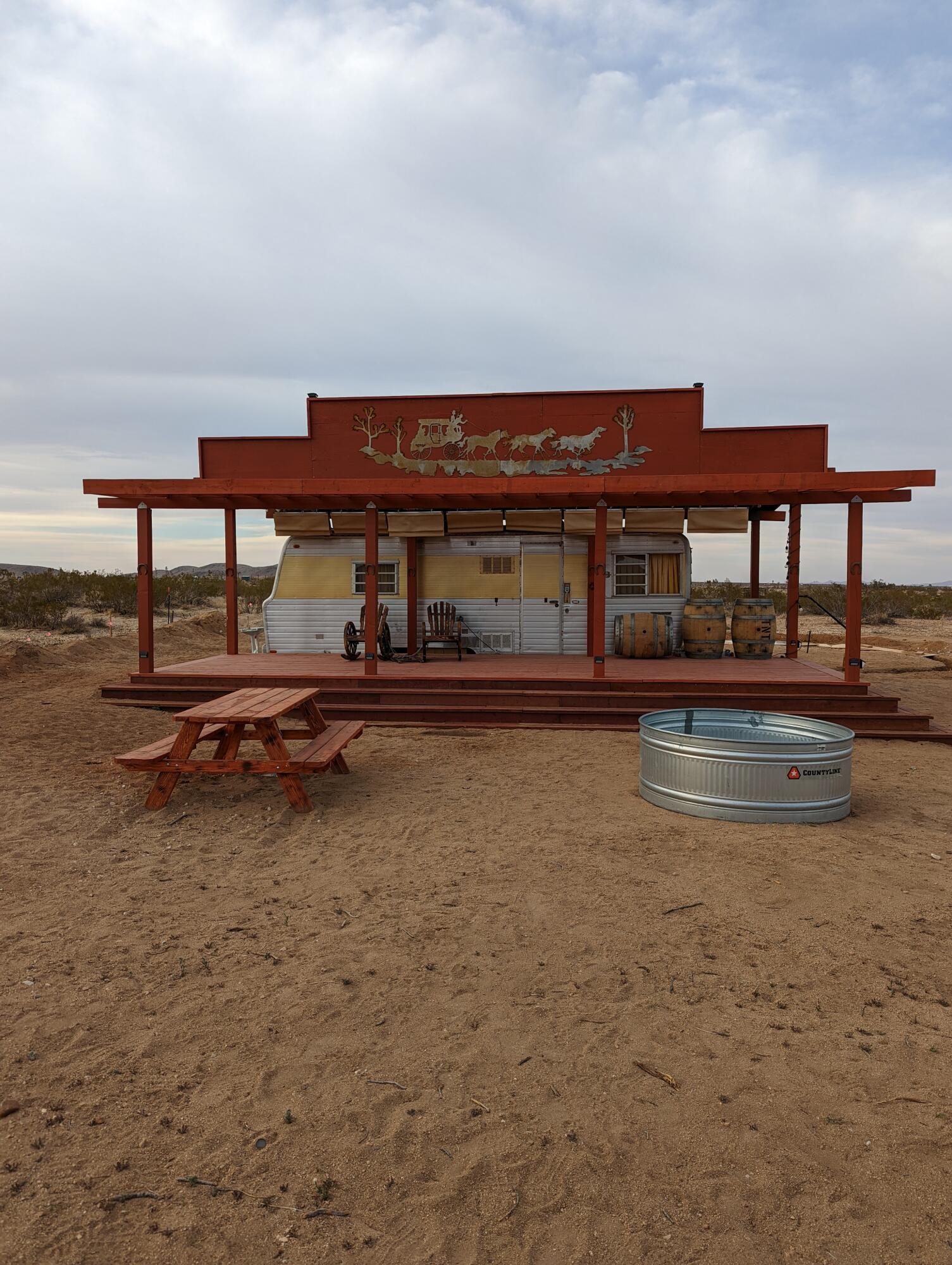 60876 Campanula Street Joshua Tree, CA 92252 - Photo 17 of 29 a view of a swimming pool with an outdoor seating