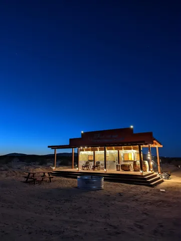 a view of a lake with houses in the back