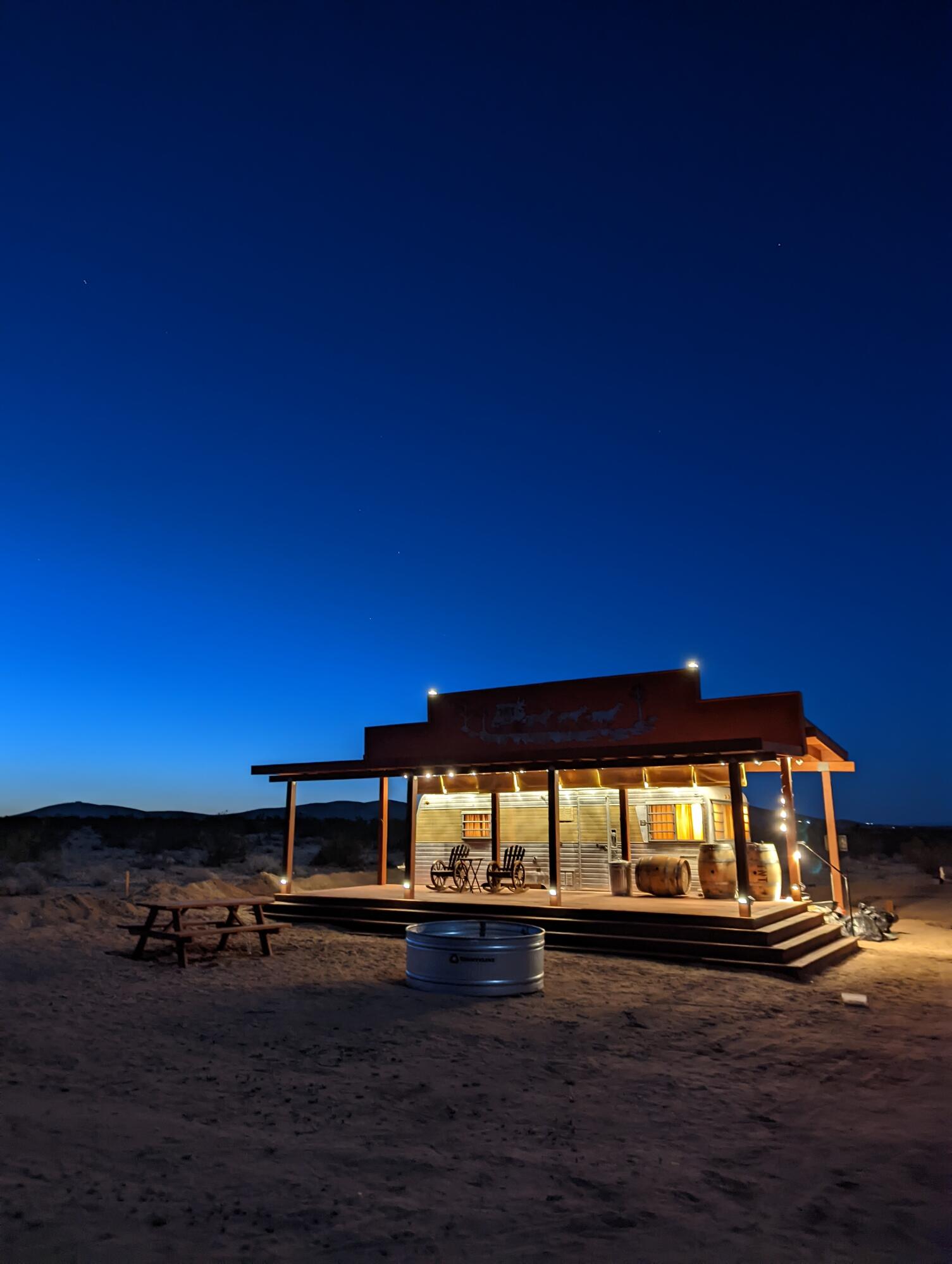 60876 Campanula Street Joshua Tree, CA 92252 - Photo 19 of 29 a view of a building with a ocean view