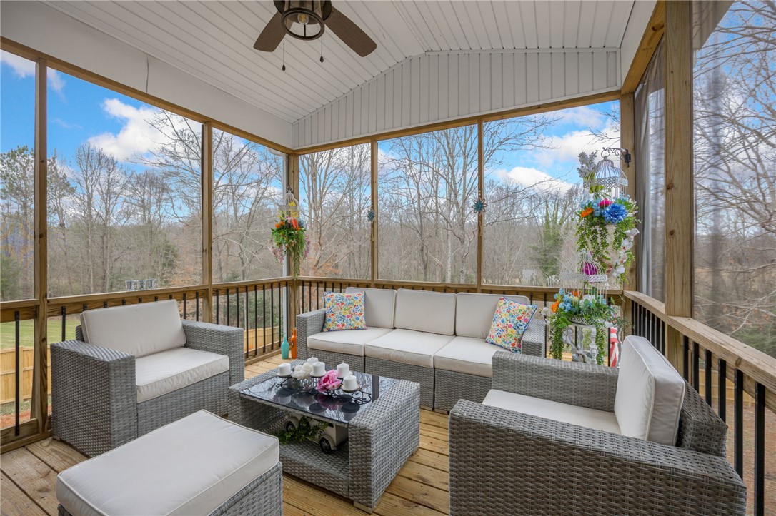28 Vanessa Rae Lane Pendleton, SC 29670 - Photo 12 of 16 This inviting screened porch provides a tranquil outdoor retreat with ample space for relaxation.
