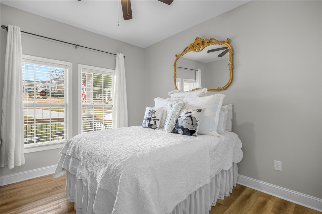 28 Vanessa Rae Lane Pendleton, SC 29670 - Photo 9 of 16 This spacious bedroom offers ample natural light and comfortable flooring for peaceful living.