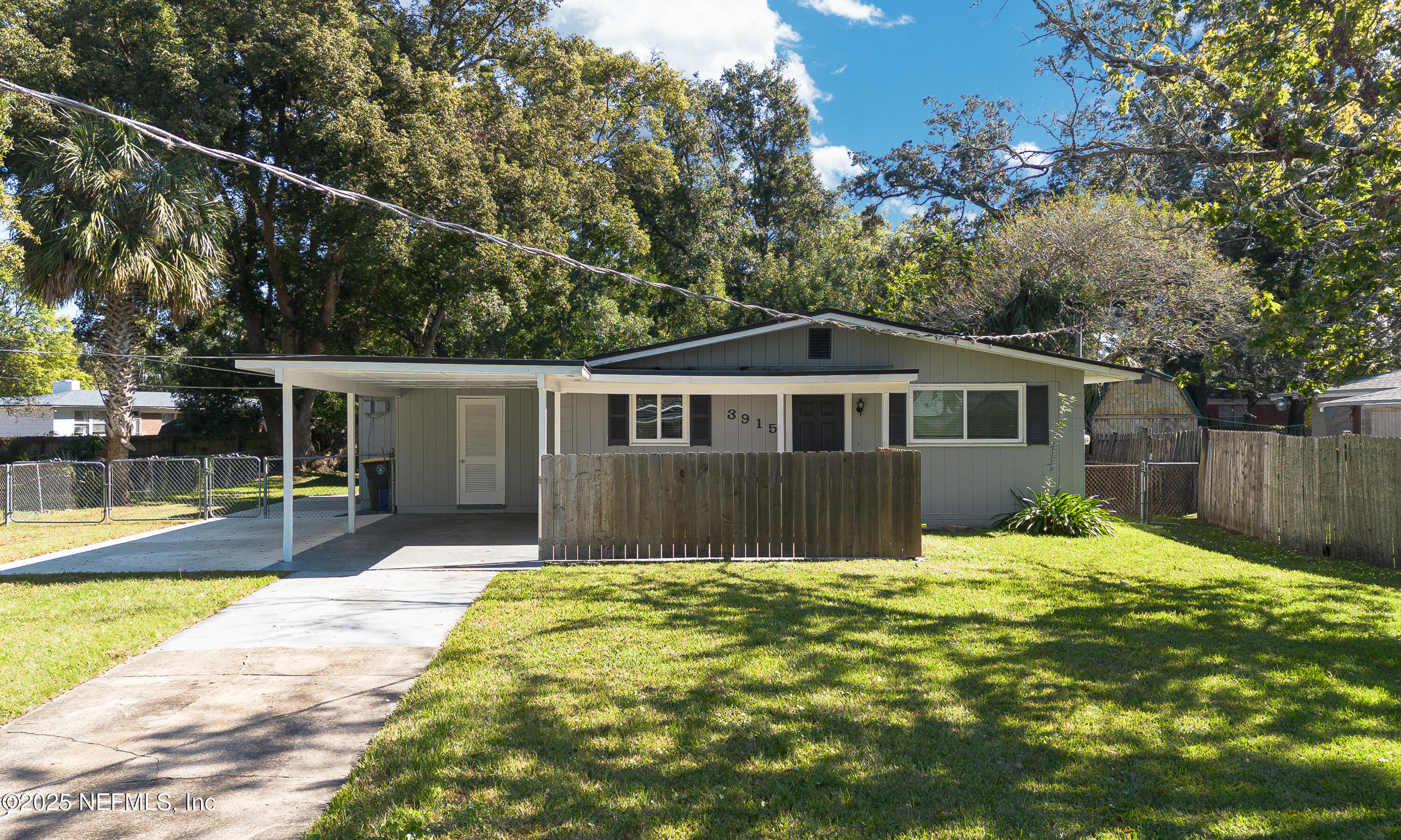 a house view with swimming pool in front of it