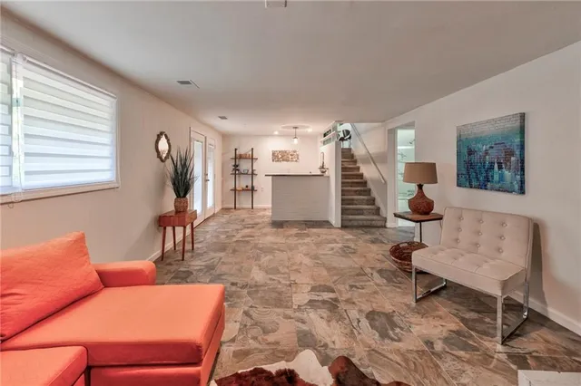 a bathroom with a sink a vanity and mirror