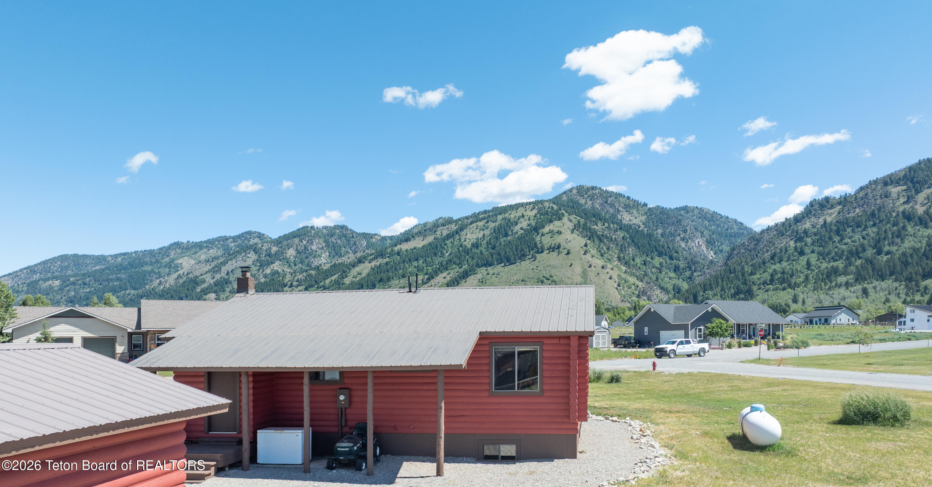 377 Butte Drive Star Valley Ranch, WY 83127 - Photo 3 of 28 377ButteDriveSVRDrone-0871