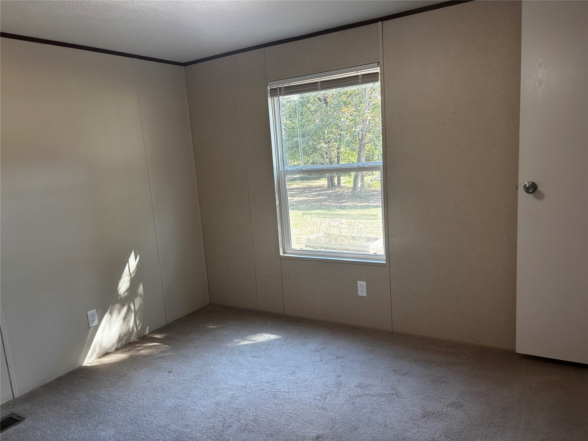 10 South Walnut Lake Drive Huntsville, TX 77320 - Photo 11 of 12 an empty room with windows