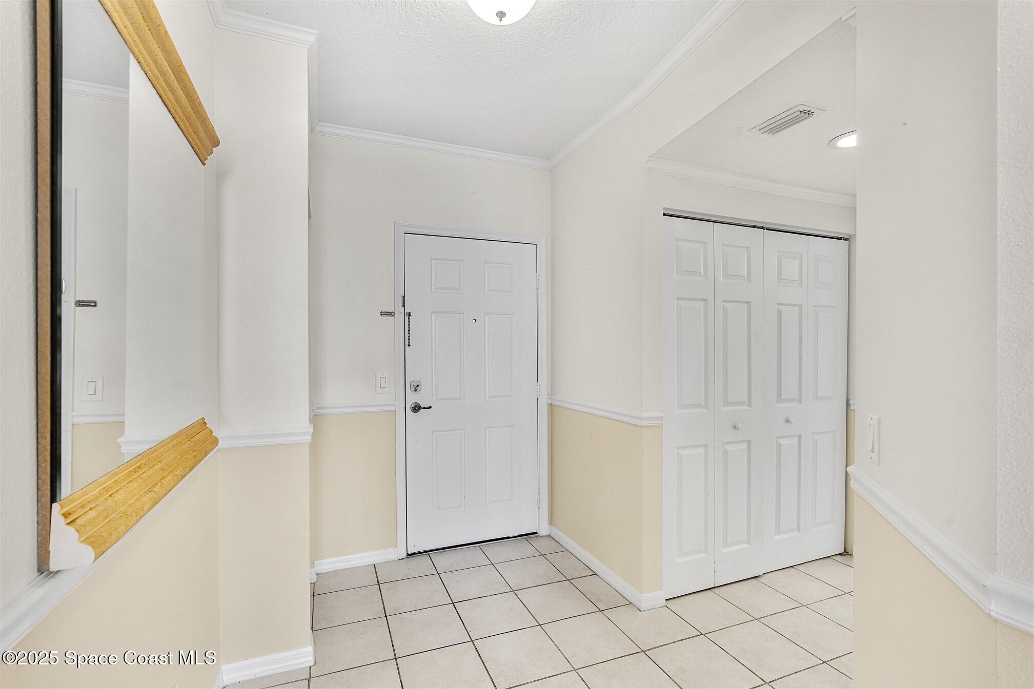 104 Riverside Drive, Unit 402 Cocoa, FL 32922 - Photo 6 of 41 a view of an entryway