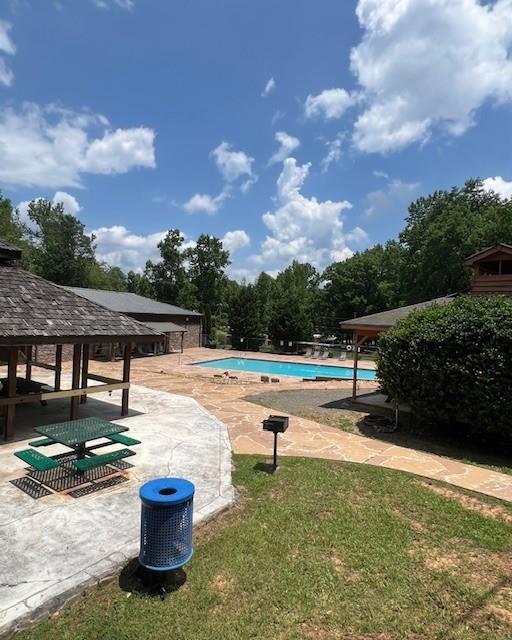 133 Adair Drive Ranger, GA 30734 - Photo 11 of 13 a view of a lake with a yard