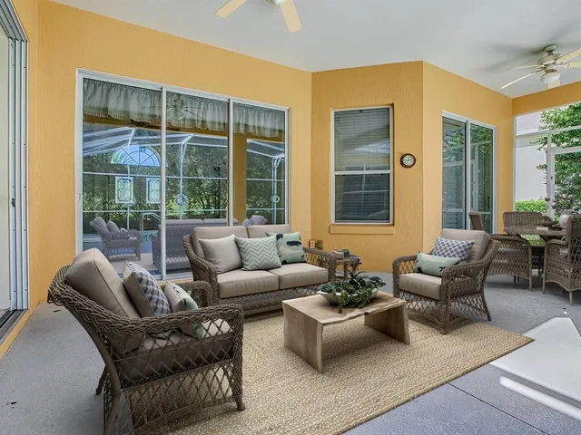 an aerial view of a house with a garden and a yard