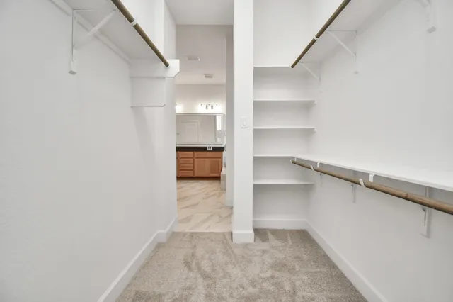 a view of a backyard with pathway