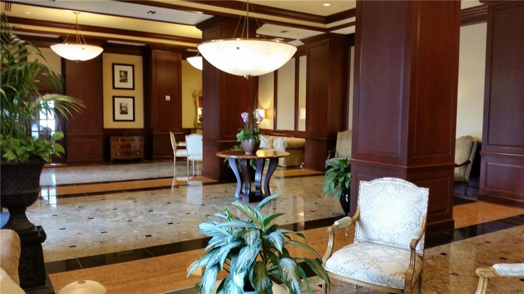 195 14th Street Northeast, Unit 304 Atlanta, GA 30309 - Photo 22 of 25 a lobby with furniture and potted plants