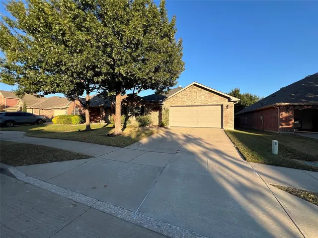 a view of a street with houses