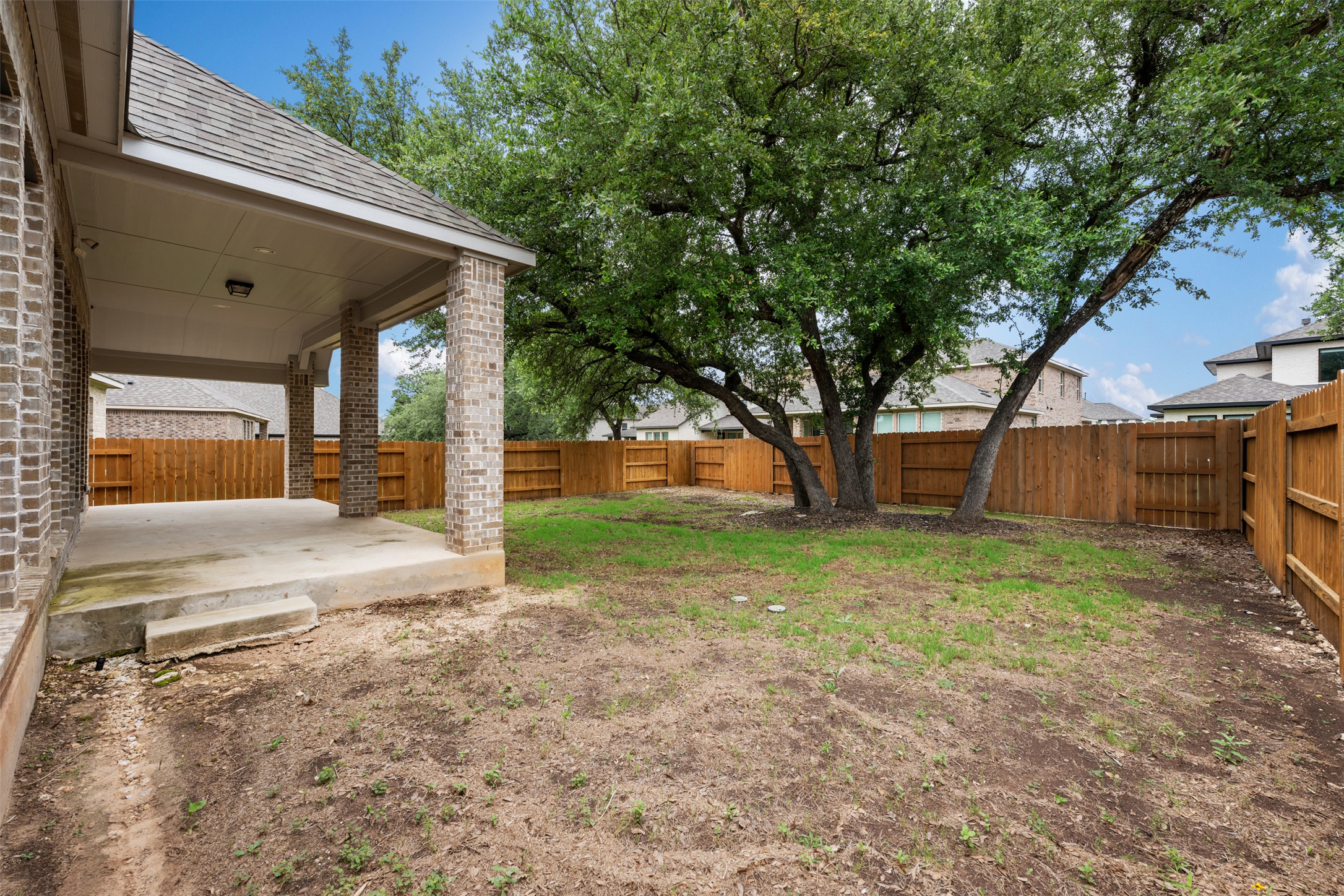 104 Anejo Bluff Georgetown, TX 78628 - Photo 39 of 40 a view of backyard of house with green space