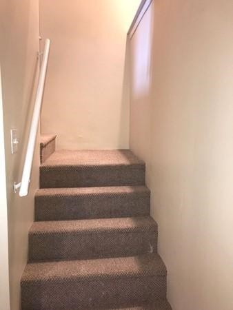 144 Salem Road Billerica, MA 01821 - Photo 14 of 16 a view of staircase with white walls