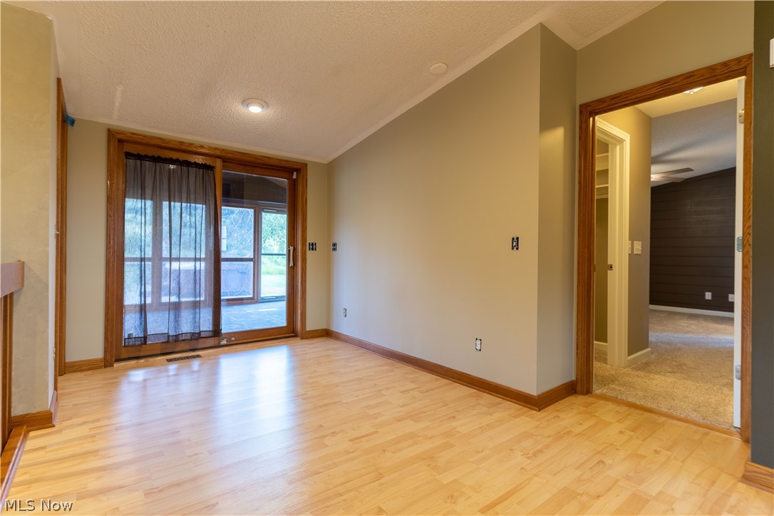 6795 Alliance Road Northwest Malvern, OH 44644 - Photo 25 of 35 Foyer out to 4 season room